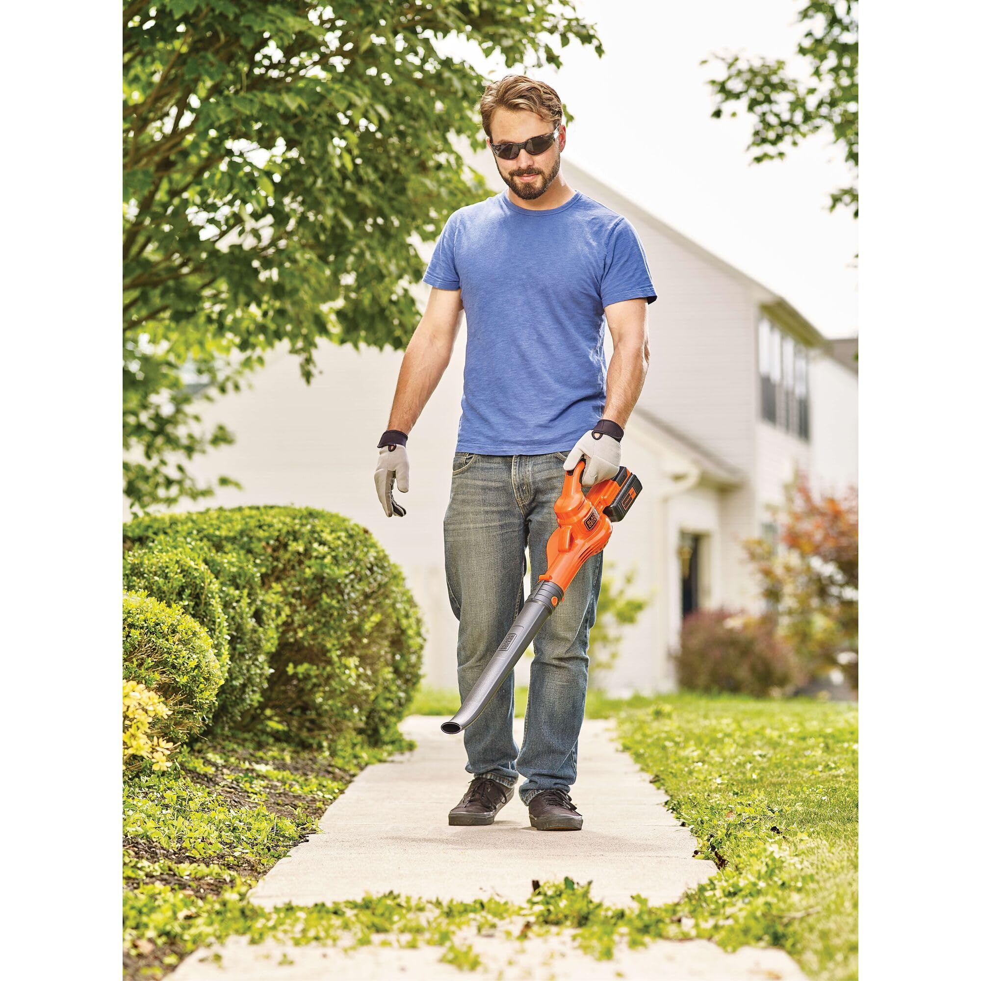BLACK+DECKER blow tube attachment for targeted debris gathering along edges.