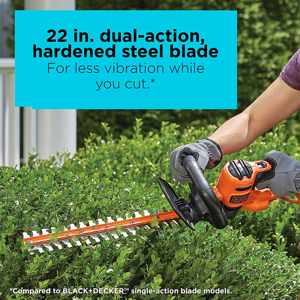 BLACK+DECKER 4-amp motor powering through thick branches for fast shaping.
