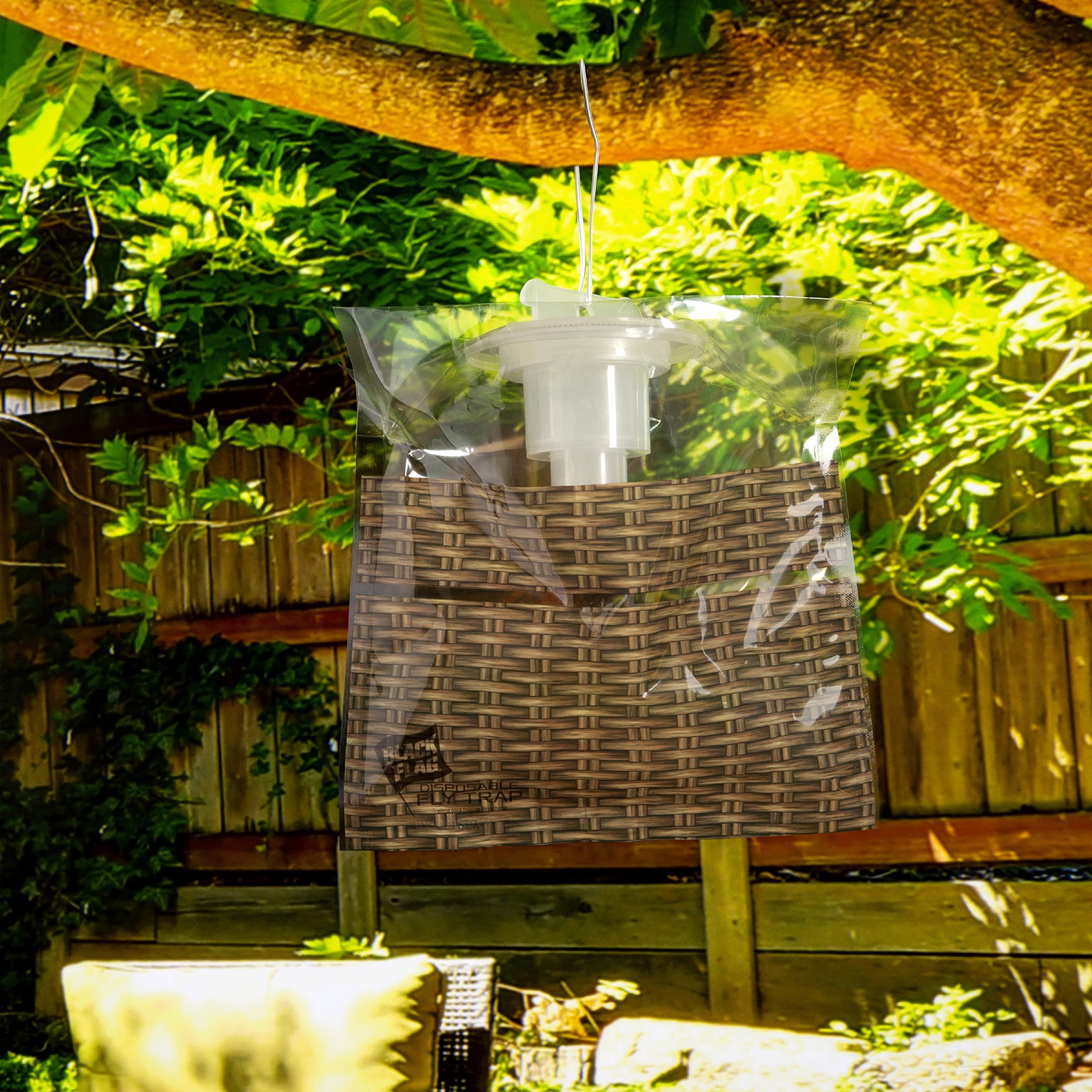 Hanging the Black Flag fly trap with included tie is quick and easy.