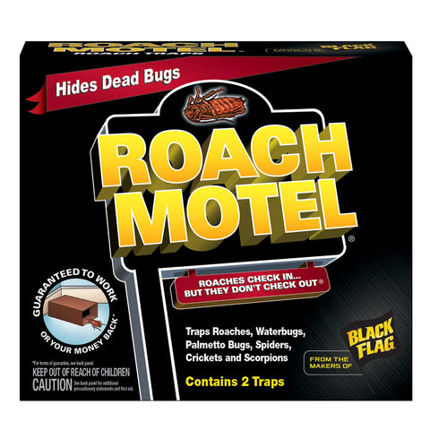 Black Flag Roach Motel trap placed in a corner for discreet monitoring.