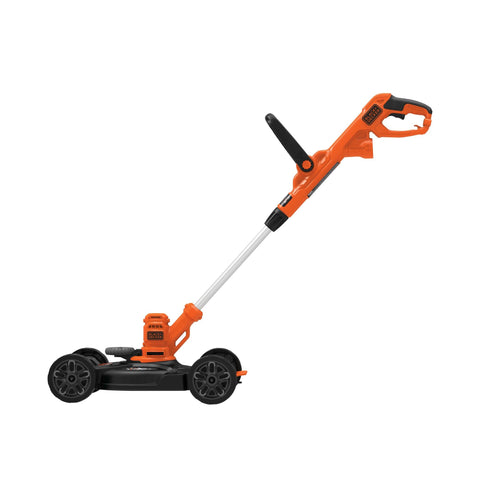 BLACK+DECKER BESTA512CM compact lawn mower in action for small yards.