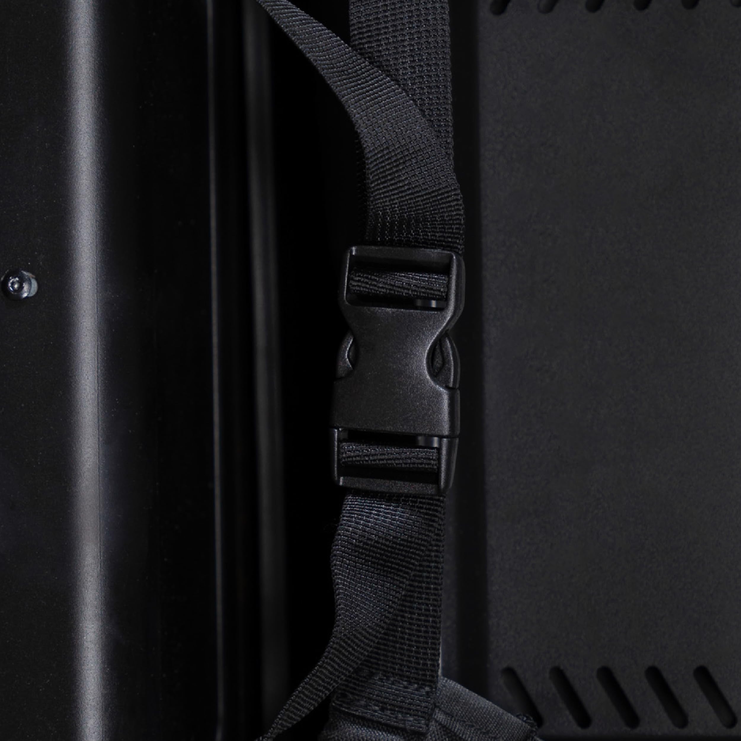 Secure buckle on the BLACKSTONE cover ensures snug fit in windy conditions