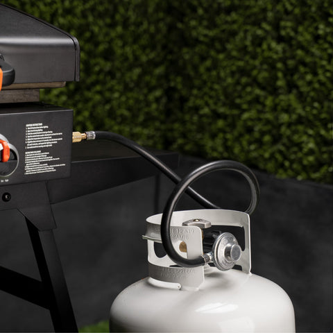 Blackstone 5471 3-foot hose extension shown in use with a tabletop griddle