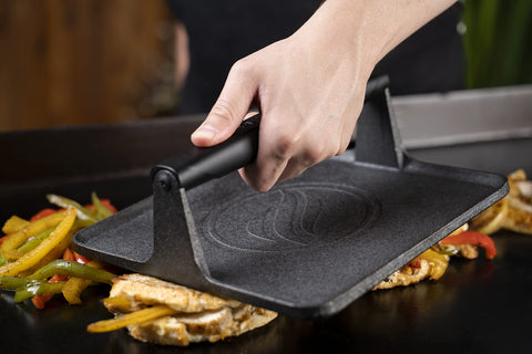Blackstone 5554 griddle press with heat-resistant handle for safe grilling