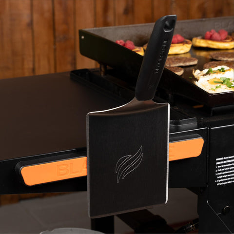 BLACKSTONE 5609 magnetic tool holder securing grilling tools during cookouts