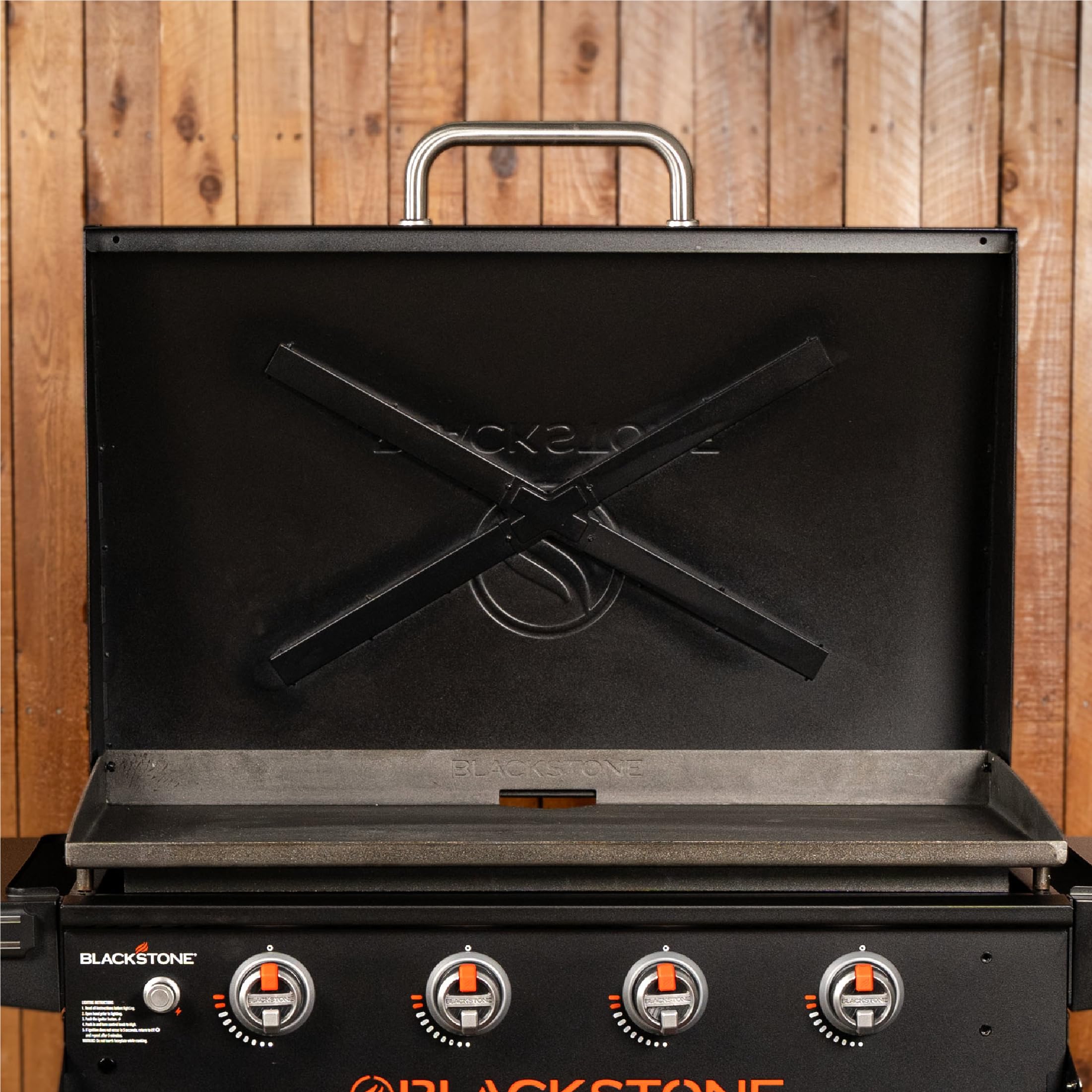 Blackstone 5856 Omnivore Hood shields dust and water during storage.