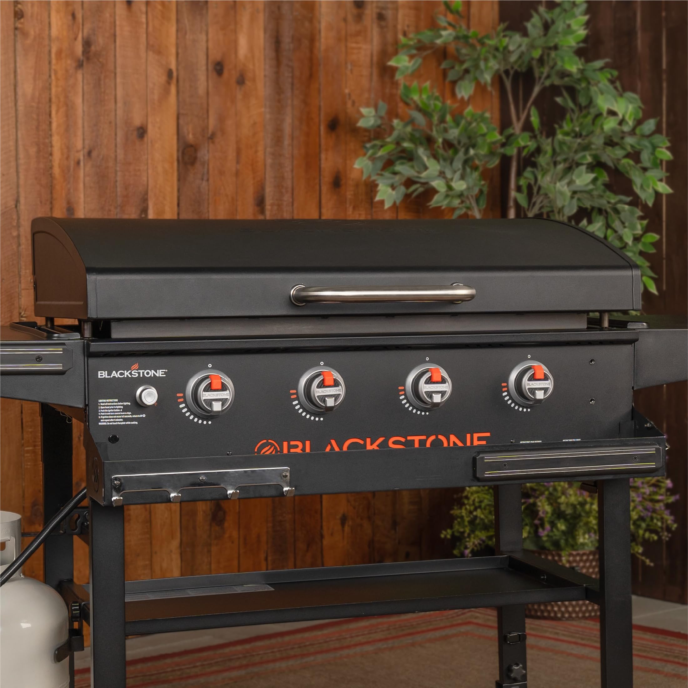 Blackstone 5856 Omnivore Hood installation shows quick fit on the 36-inch griddle.