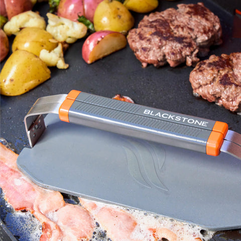 Blackstone 5987 OTG collapsible griddle press saves space with compact storage design.