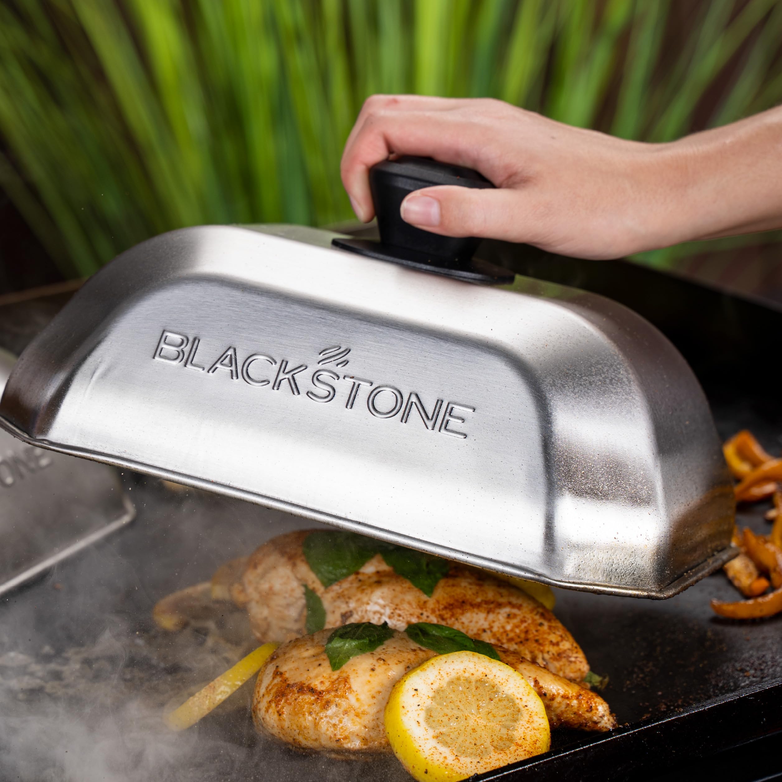 Blackstone dishwasher-safe basting cover simplifies cleanup after cooking.