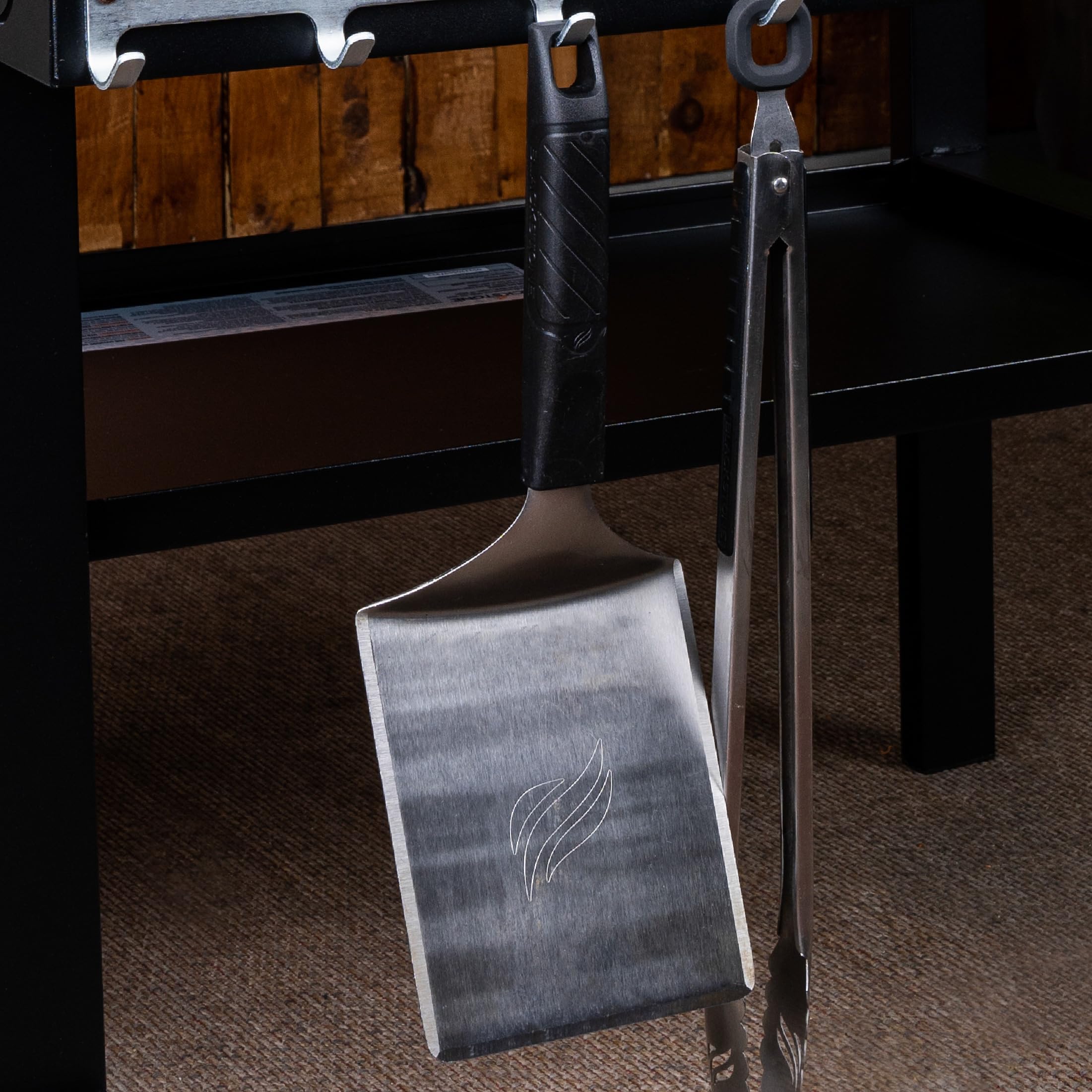 Blackstone spatula after cooking, showcasing easy-clean, stain-resistant blade.