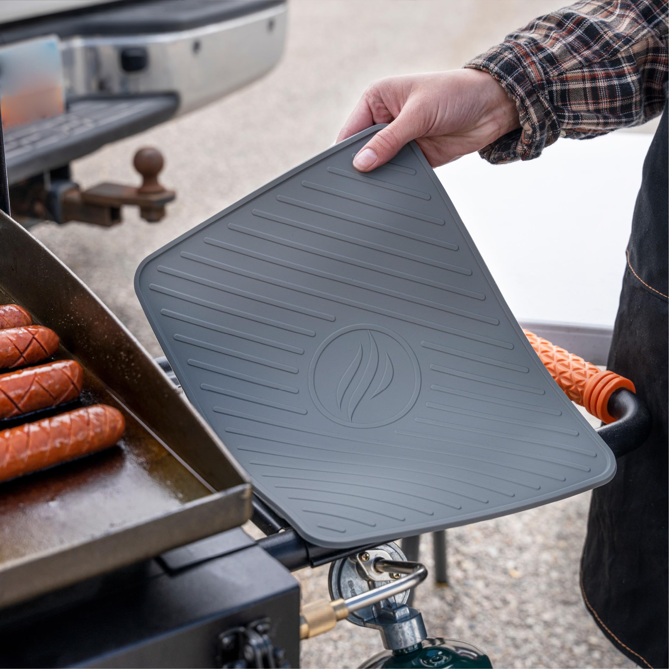 BLACKSTONE spatula mat close-up demonstrating dishwasher-safe cleaning convenience.