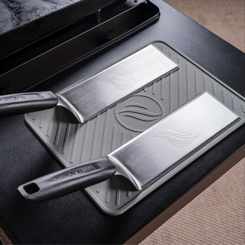 BLACKSTONE spatula mat used as utensil rest to keep counters clean.