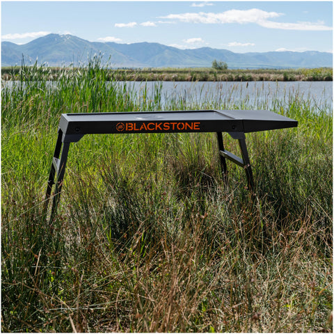 Adjustable legs allow dialing in a comfortable outdoor cooking height.