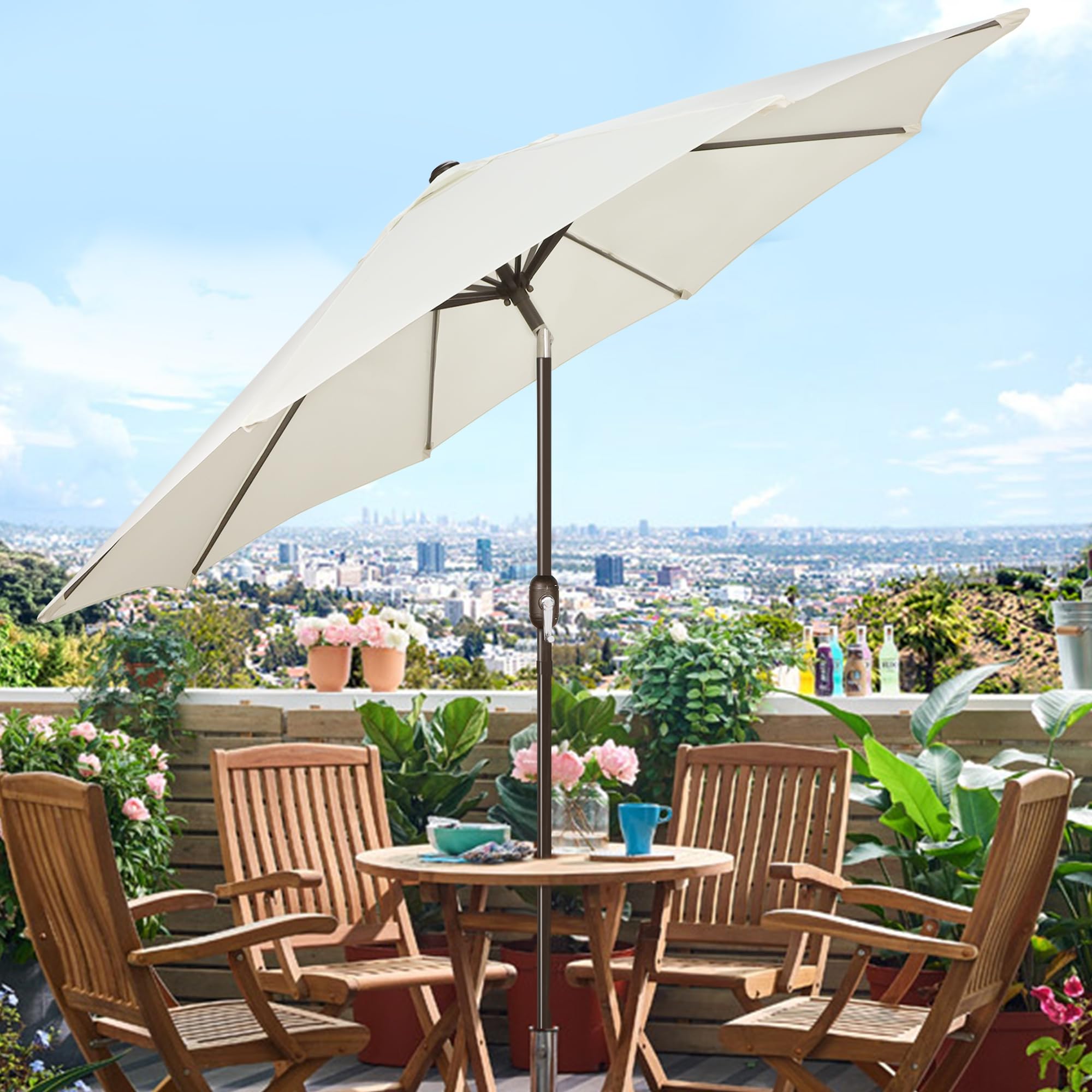 Blissun 9ft diameter umbrella offering sun protection for tables and chairs.