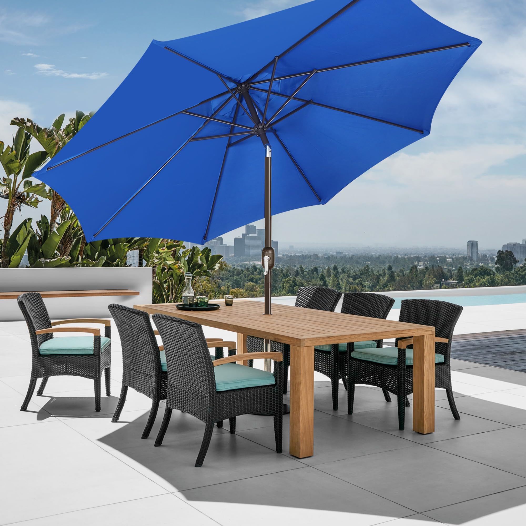 Blissun 9 ft diameter fits 4–6 chairs around various tables.