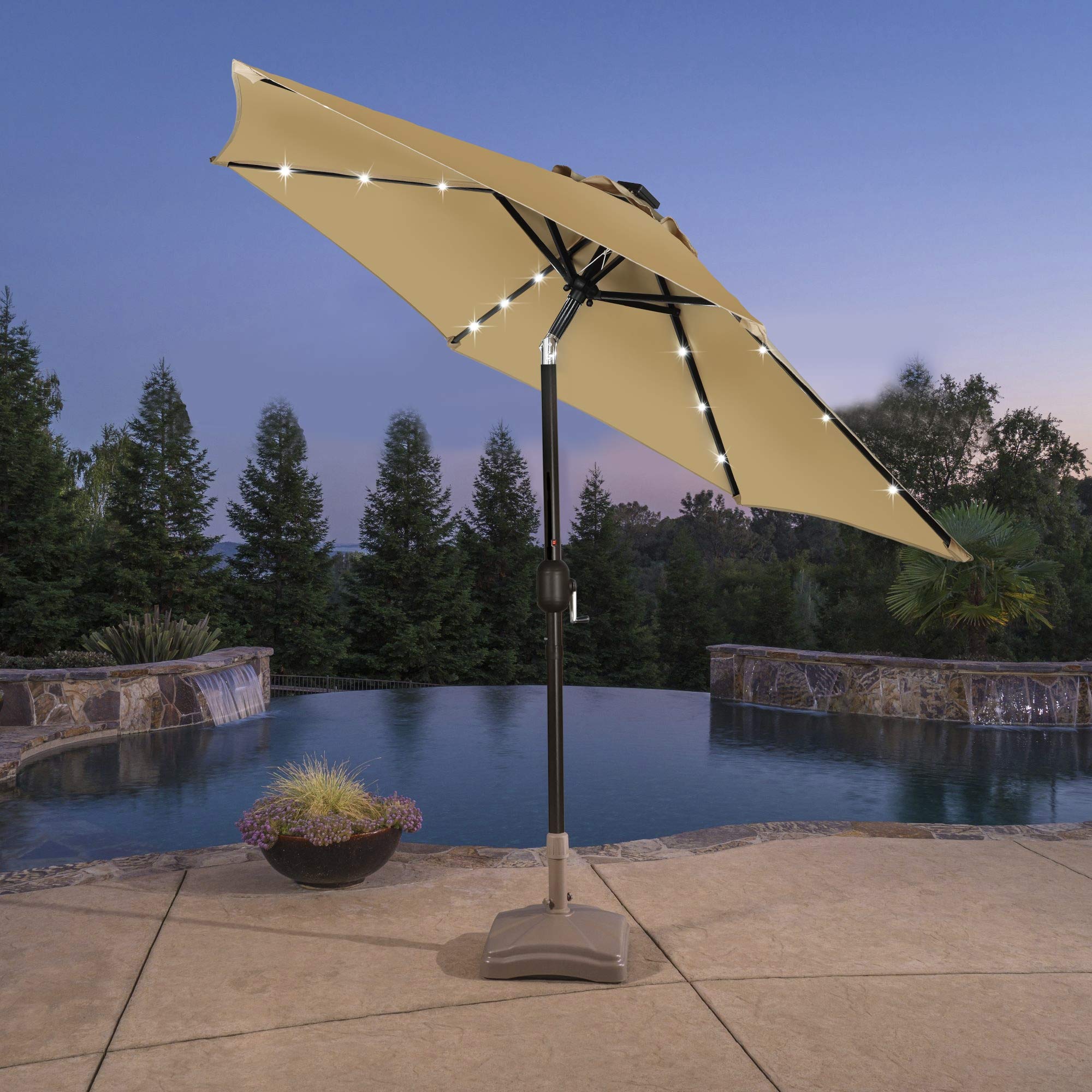 Blissun evening dining setup with lit canopy for ambient outdoor moments.