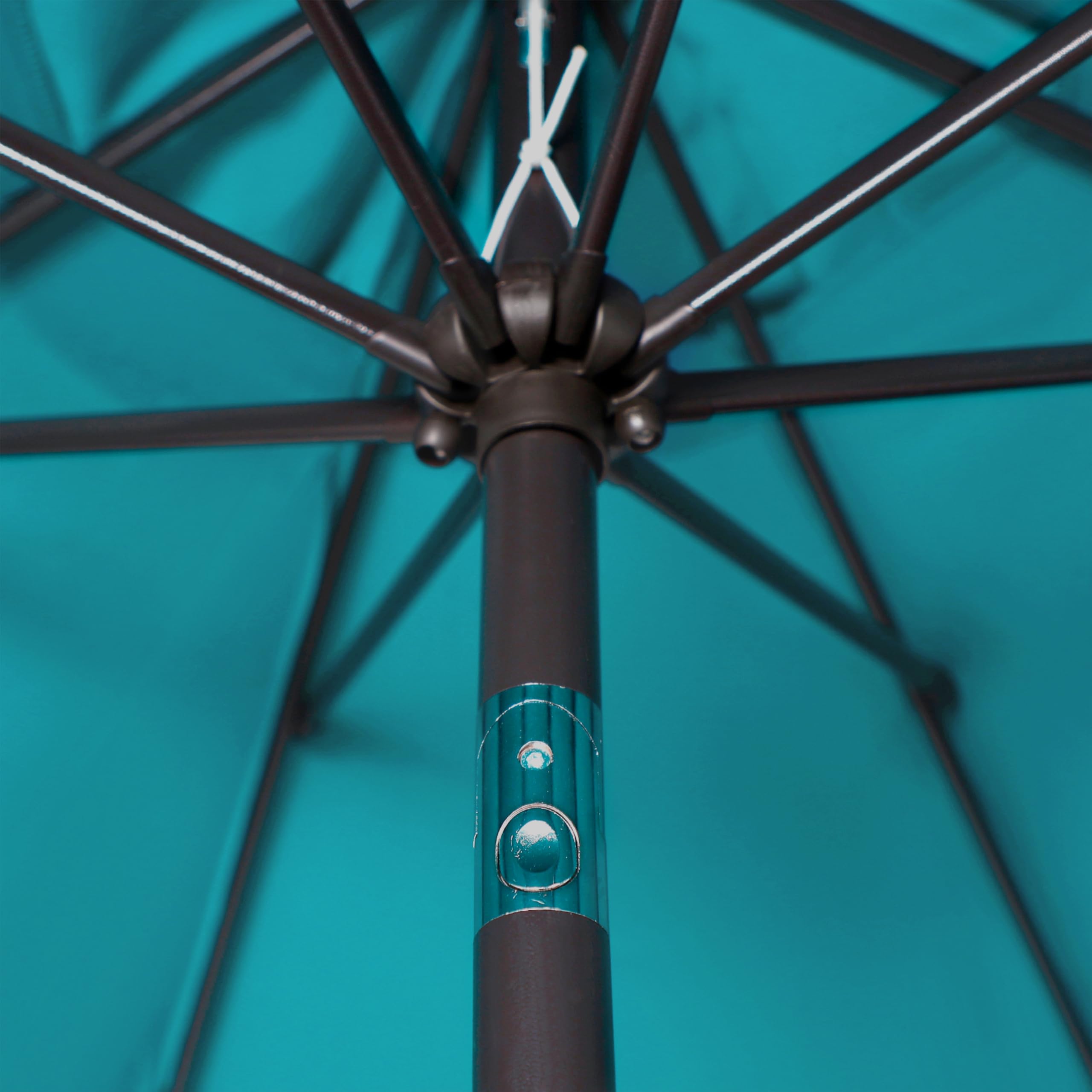 Blissun market umbrella tilt and crank for easy shade adjustment.