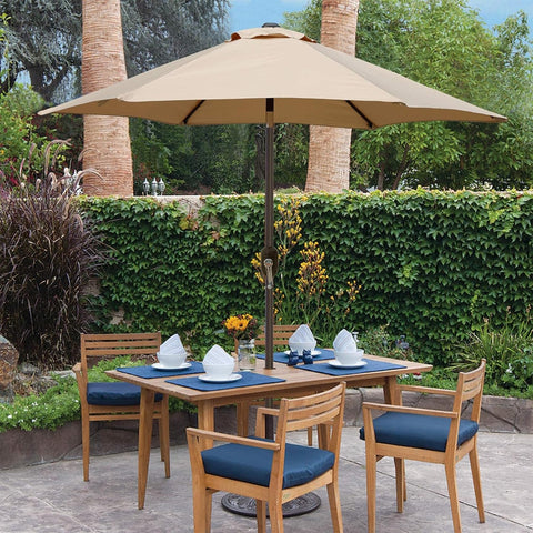 Blissun outdoor dining setup shading a table and chairs