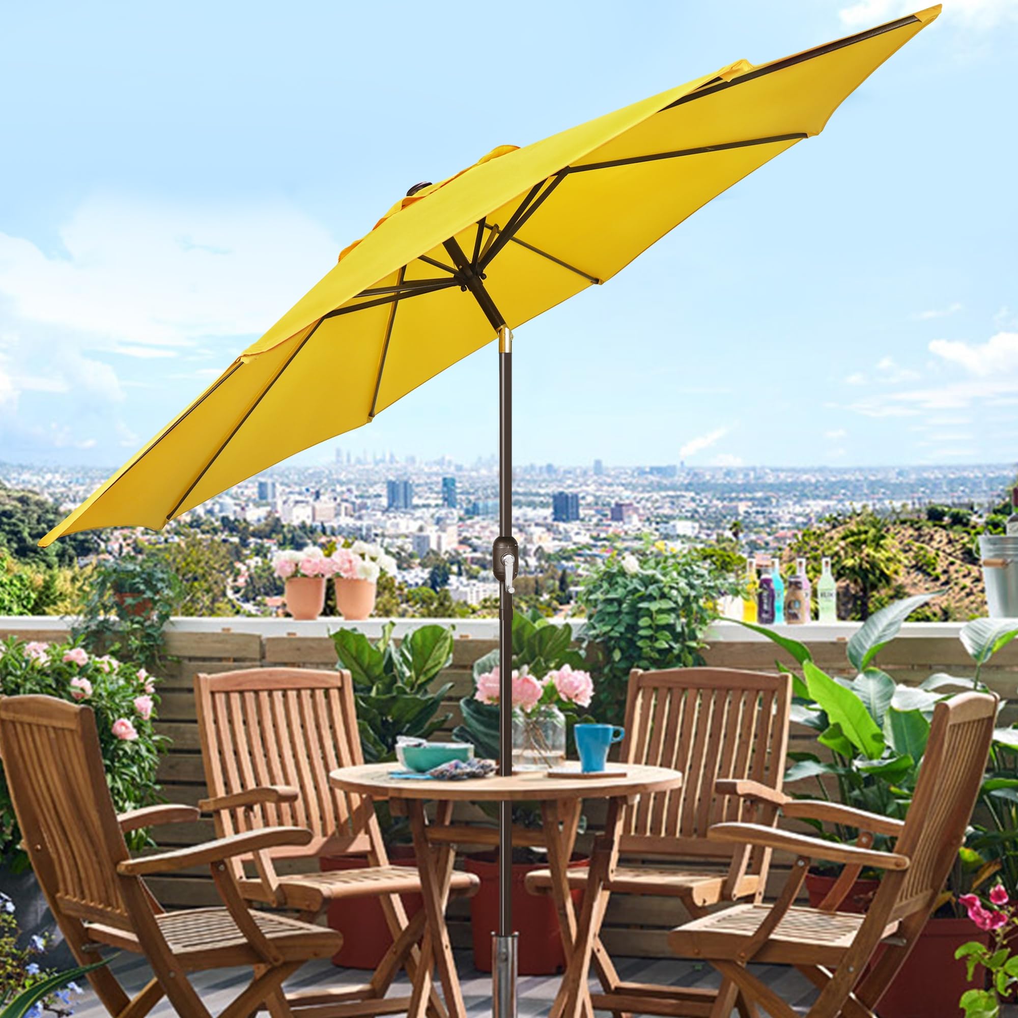 Blissun yard umbrella over round table creates inviting shade.