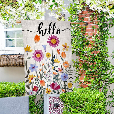 Double-sided BLKWHT flag shows cheerful floral design from both sides.