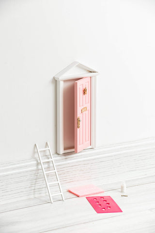 Blminiatures tooth fairy door opening feature with dowel hinges for interactive storytelling.