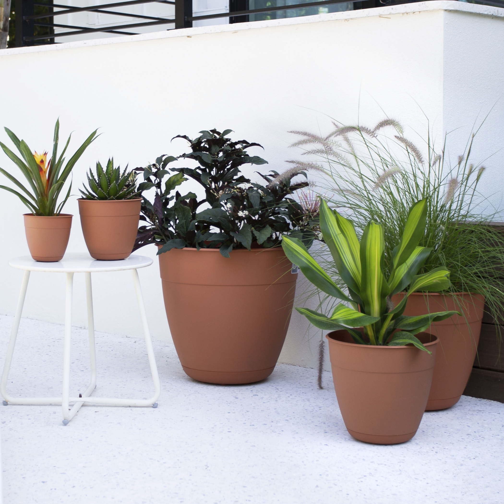 Bloem Dayton planter side view shows compact footprint and durability.
