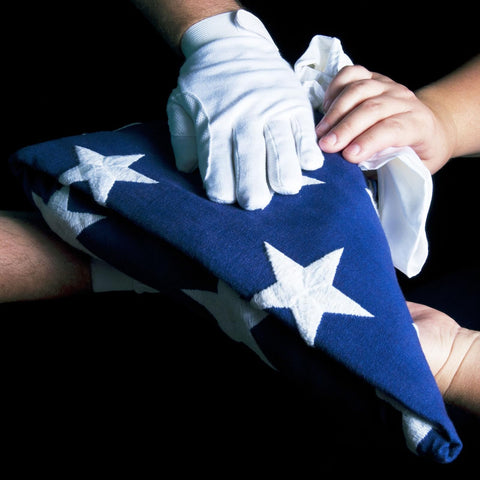 BLUE PANDA flag draped over a casket for dignified tribute.