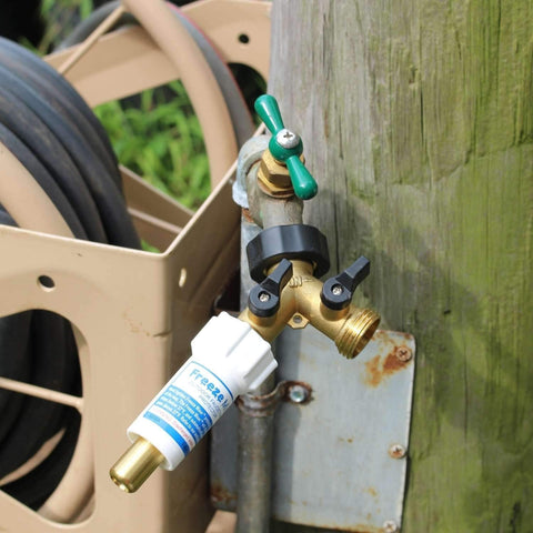 Blue Penguin brass hose connector setup shows simple hand-tightening for quick seasonal use.