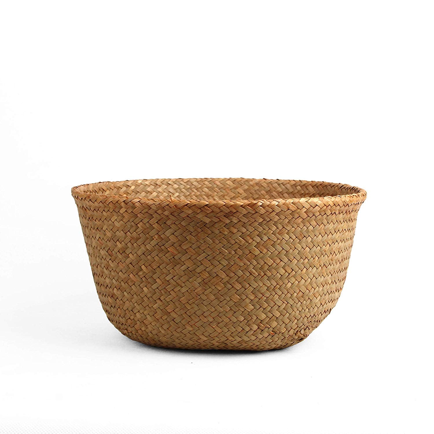 BlueMake Seagrass Belly Basket as a beach bag for a day out.