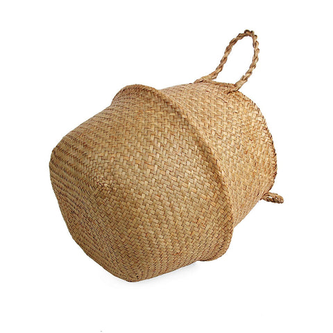 BlueMake Seagrass Belly Basket as plant pot cover for a planter.