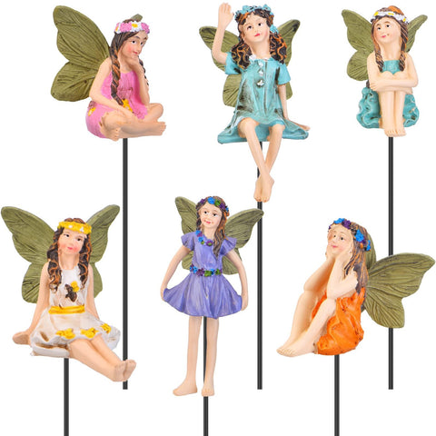 Blulu fairy figures in pots brighten plant displays.