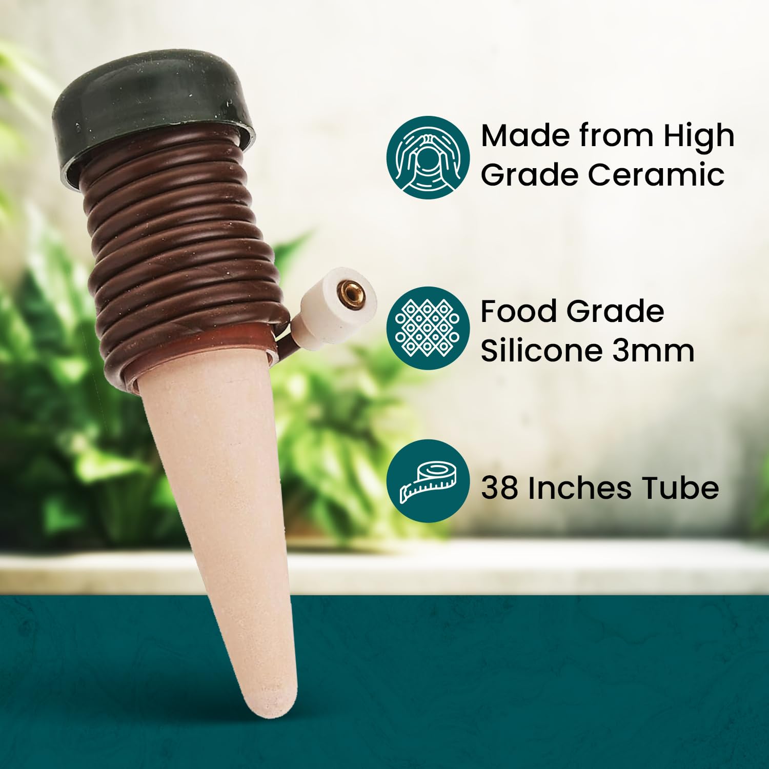 Blumat stake near an outdoor plant for reliable watering