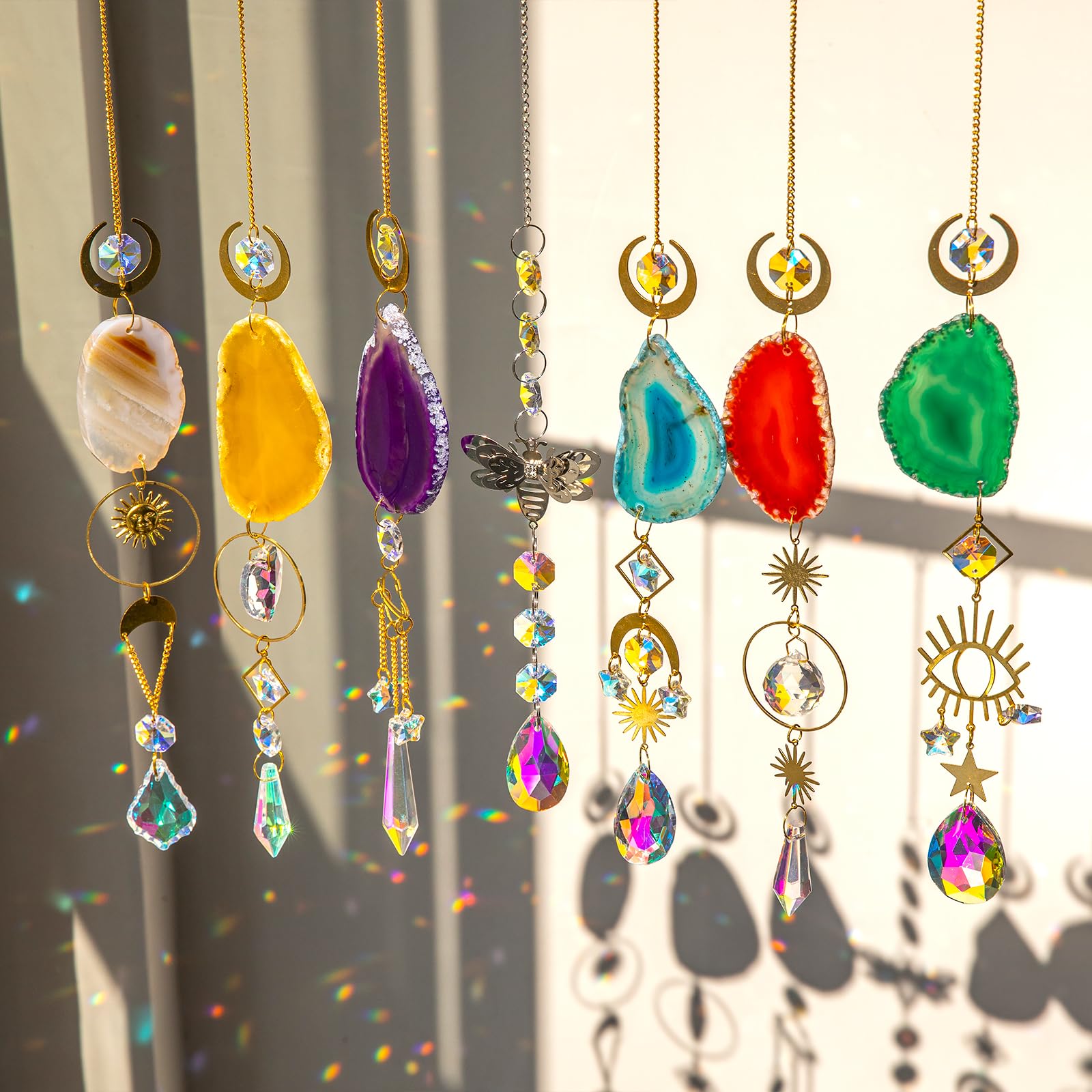 BlumWay 7-piece crystal suncatchers illuminate windows with colorful rainbow reflections.