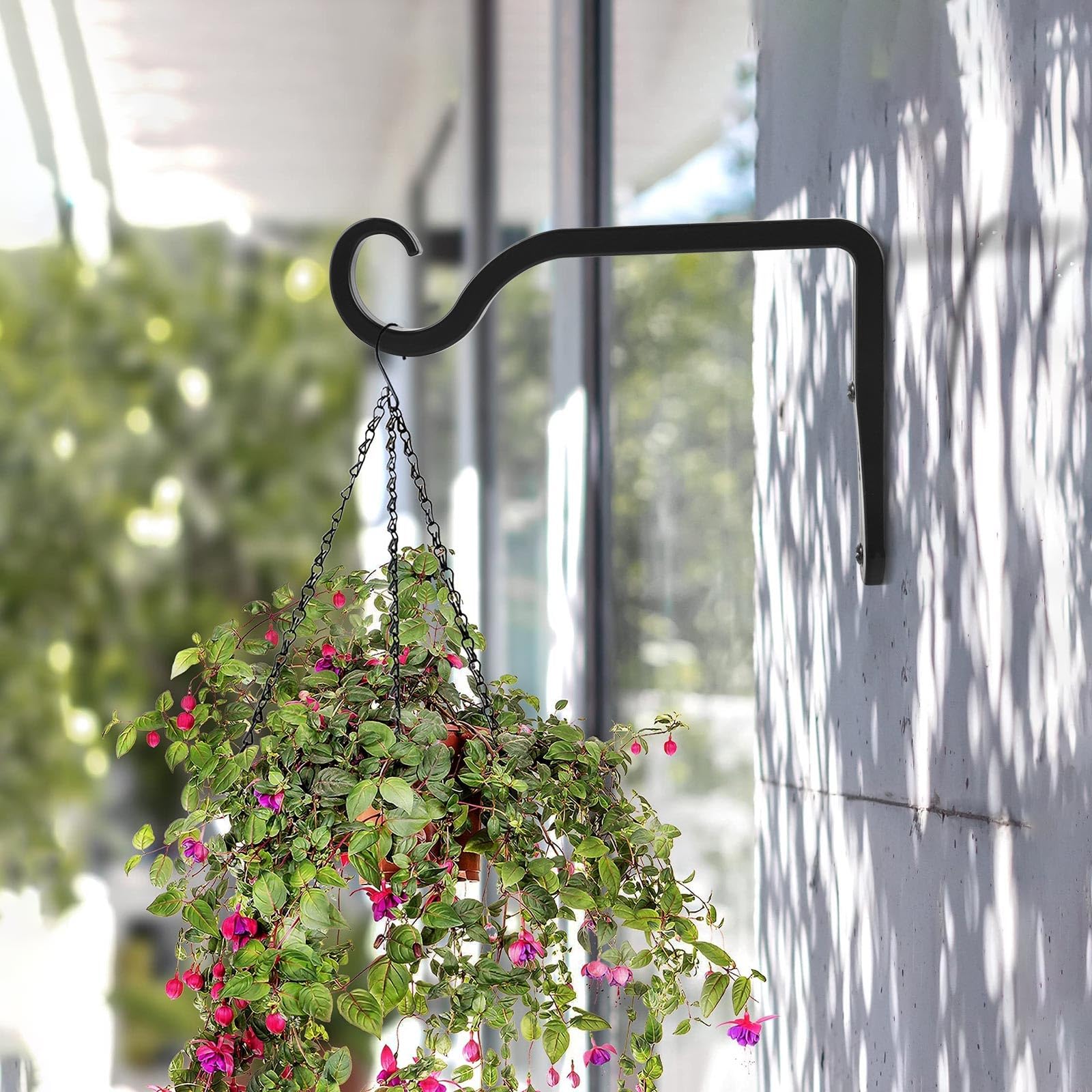 BOLITE wall hook for hanging planters and feeders in garden spaces.