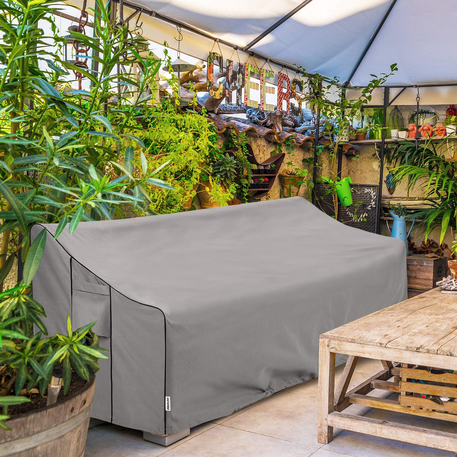 BOLTLINK durable cover protects furniture from sun, snow, and rain.