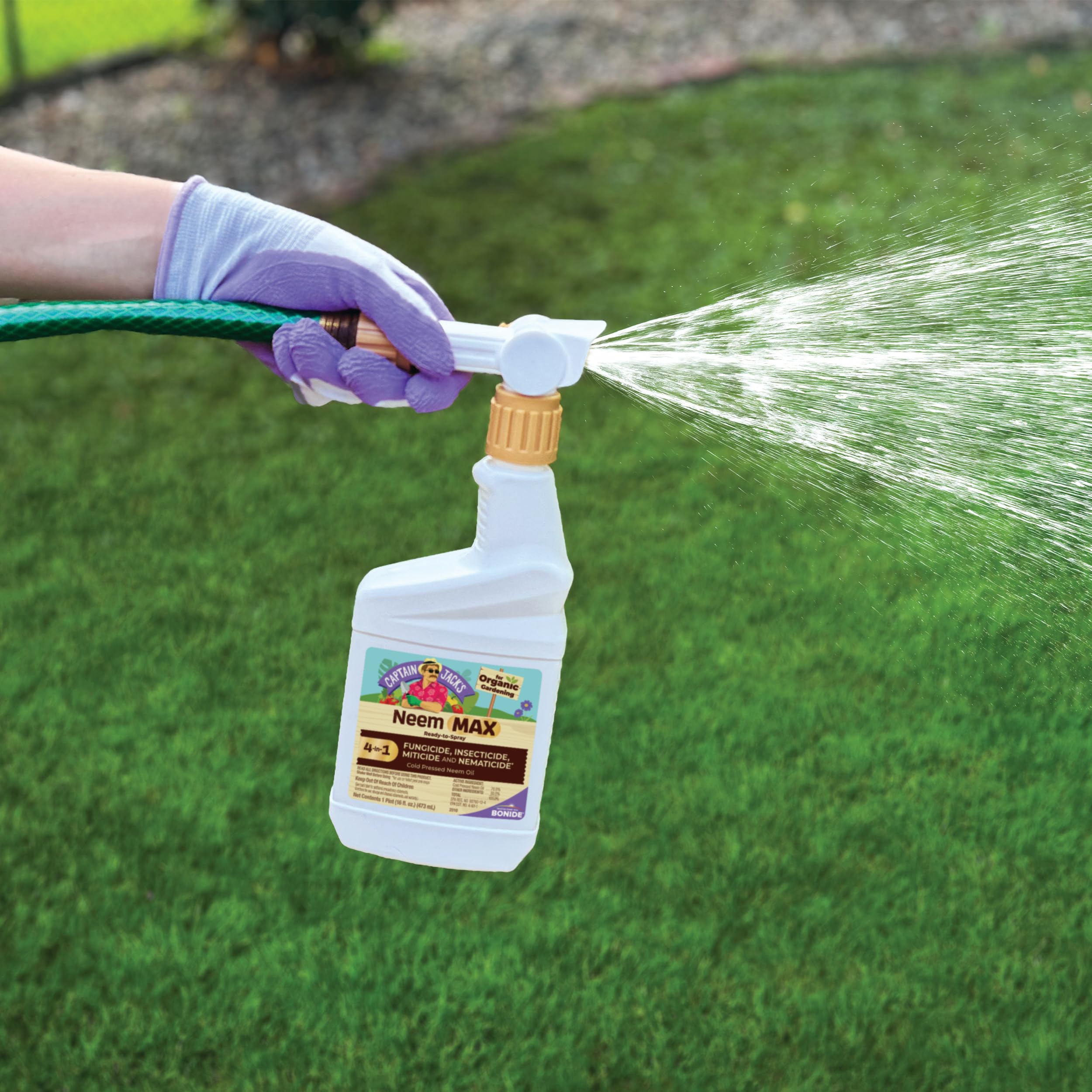 Captain Jack's Neem Max hose-attachment setup for convenient garden application