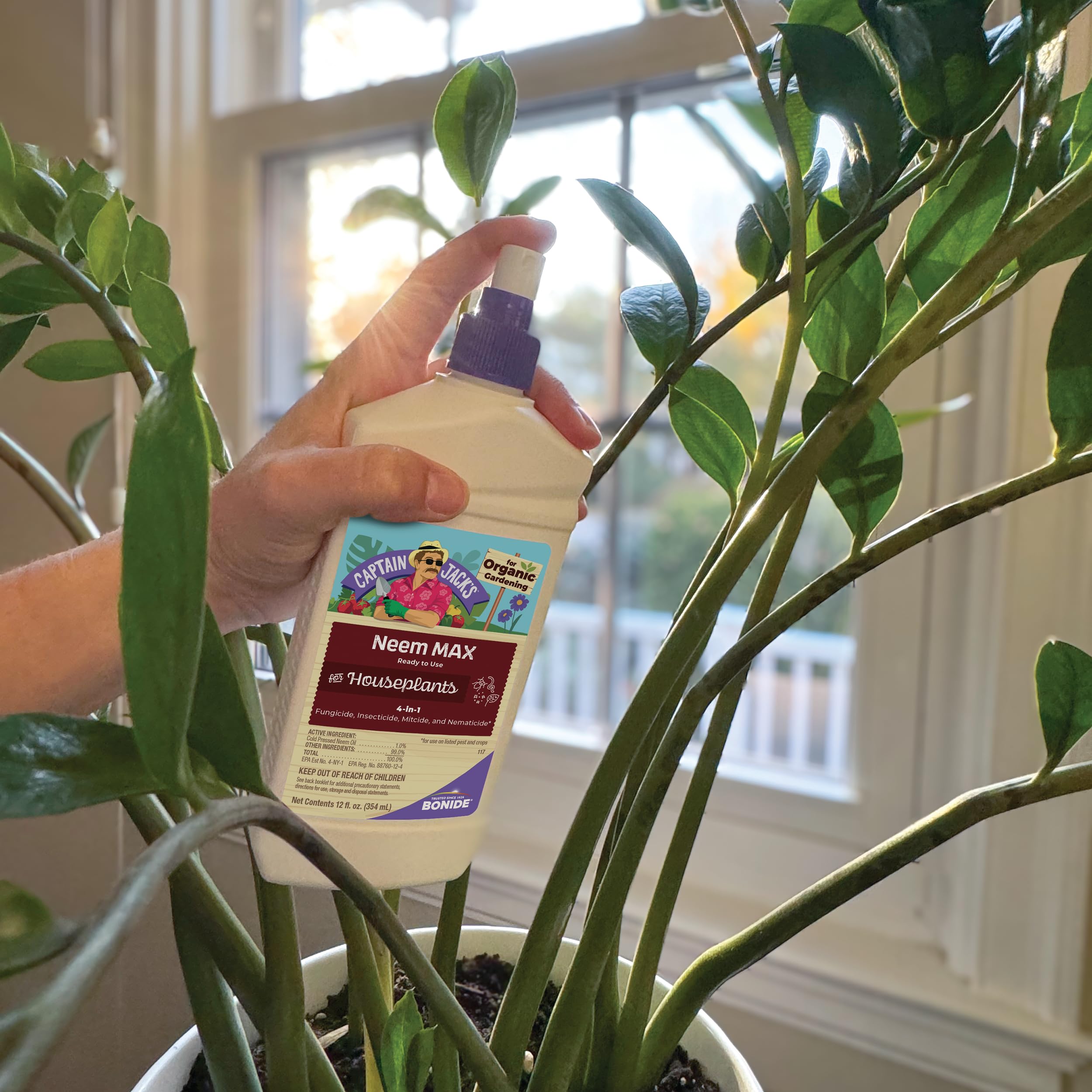 Neem Max ready-to-use bottle shown with a lush indoor garden setup