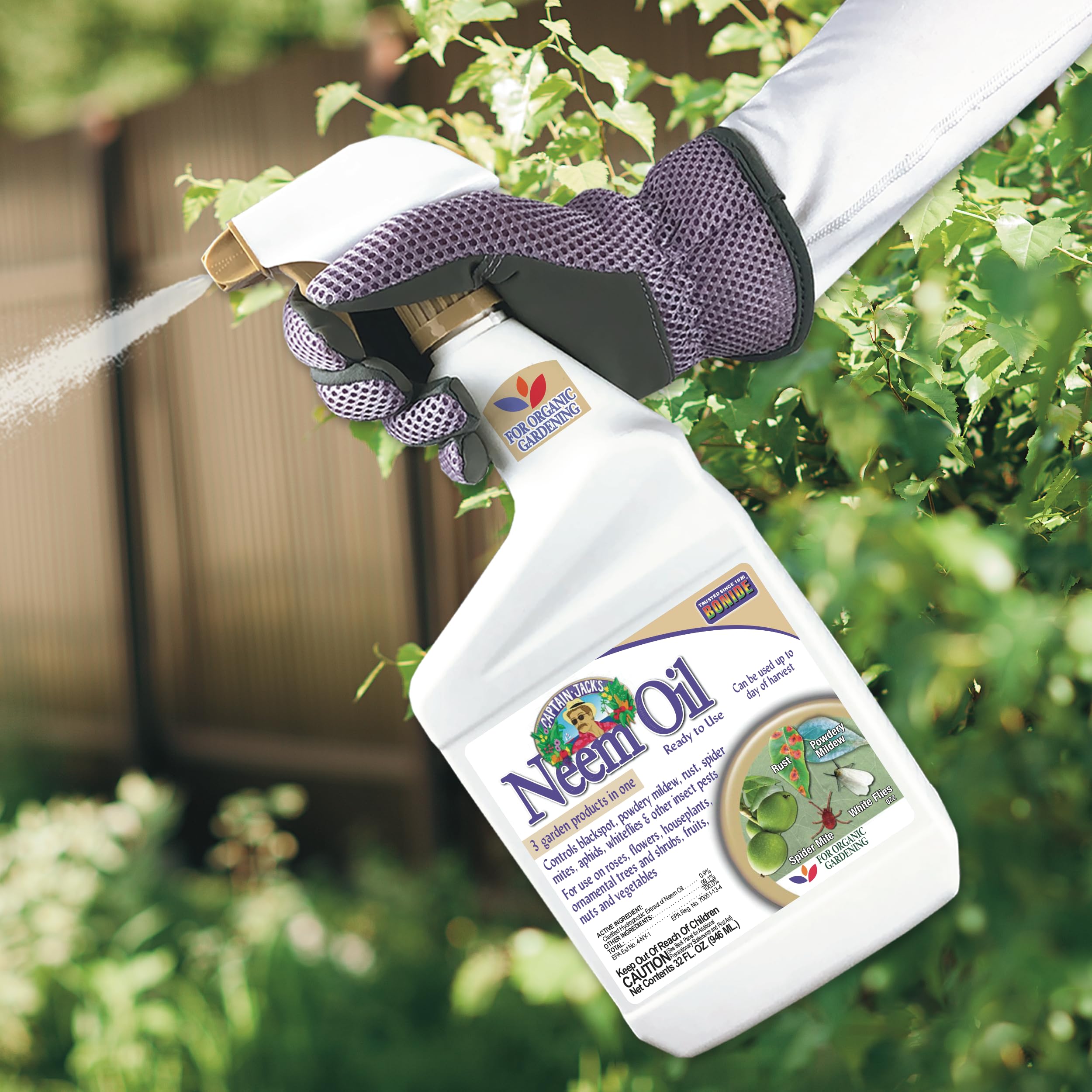 Bonide Captain Jack's Neem Oil ready-to-use spray nozzle in action for quick pest relief.