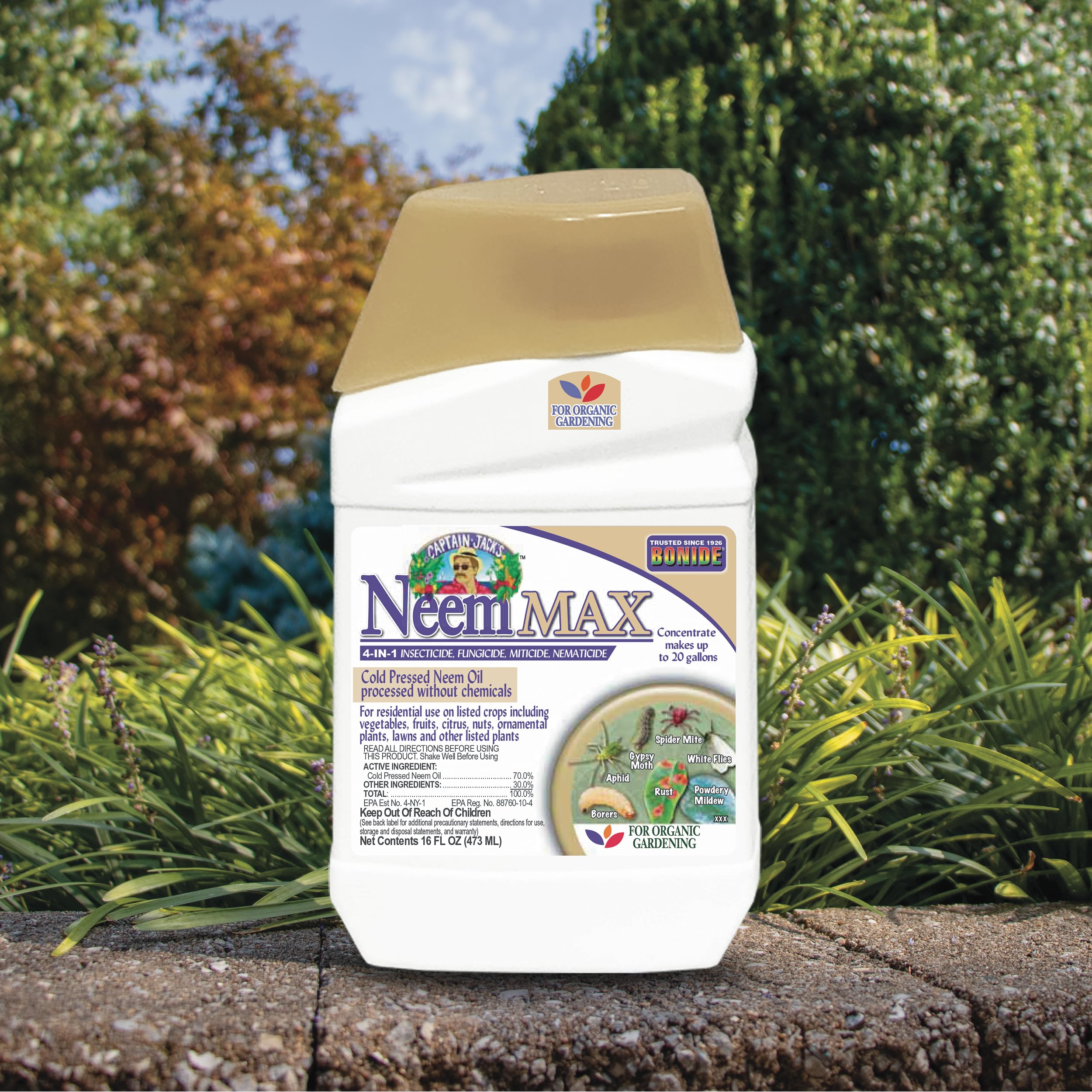 Bonide Captain Jack's NeemMax label close-up showing organic multi-use solution for gardens.