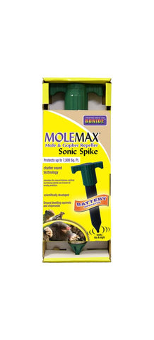 Bonide MoleMax Spike installed in a lawn to deter burrowing rodents.