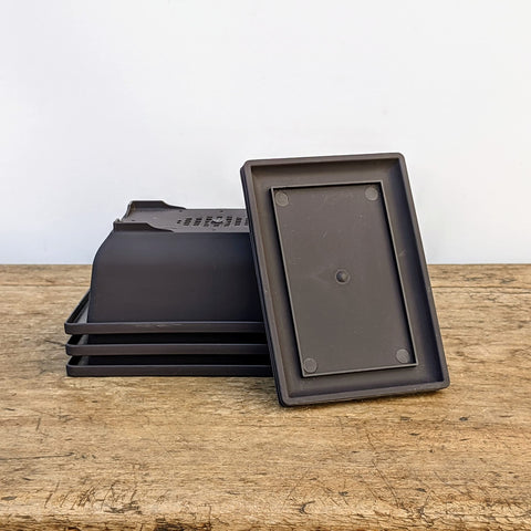 Bonsai Outlet stackable design for easy transport and storage.