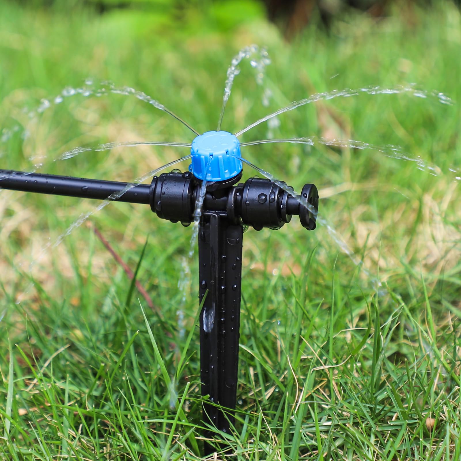 Bonviee flower bed irrigation emitting targeted streams.