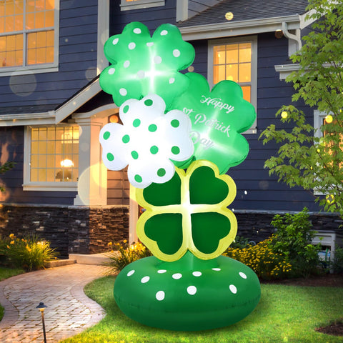 Boveco shamrock inflatable with LED lights brightens outdoor yard at night.