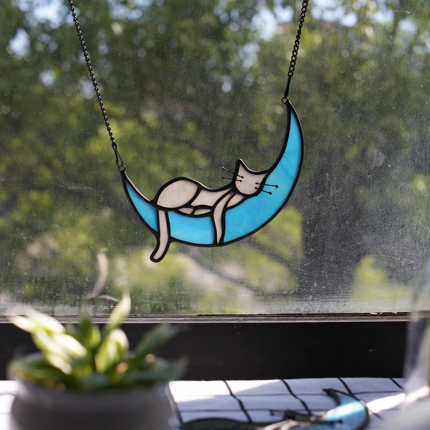 BOXCASA cat memorial suncatcher on moon adds warm remembrance to a room
