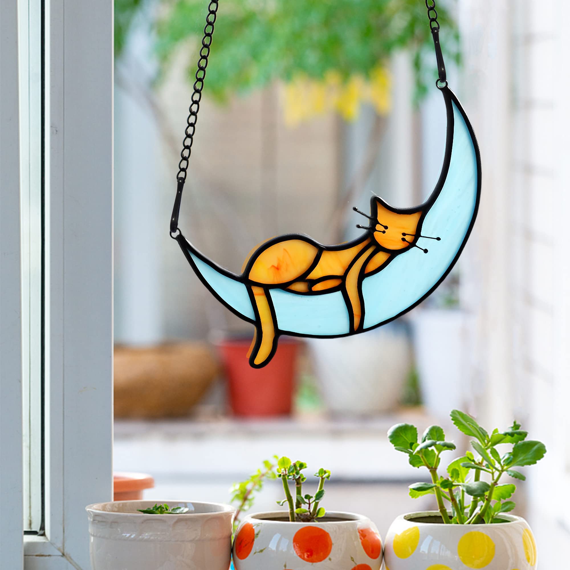 BOXCASA orange cat on moon creates a peaceful sunlight glow.