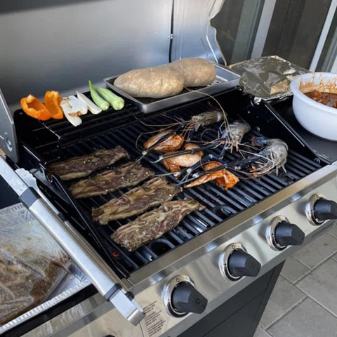 BQMAX outdoor grilling session with cast iron grate for flavorful searing