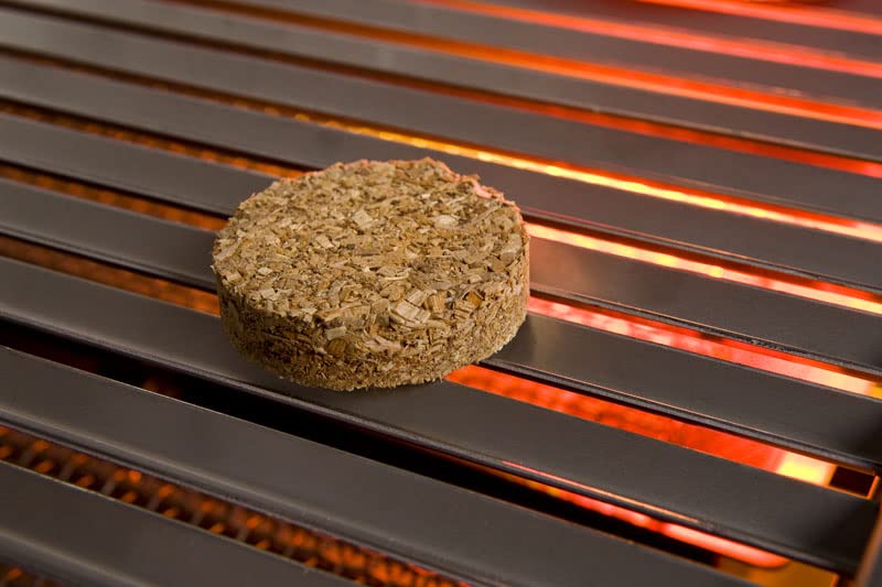Bradley Smoker Hickory smoke rising from bisquettes in action.