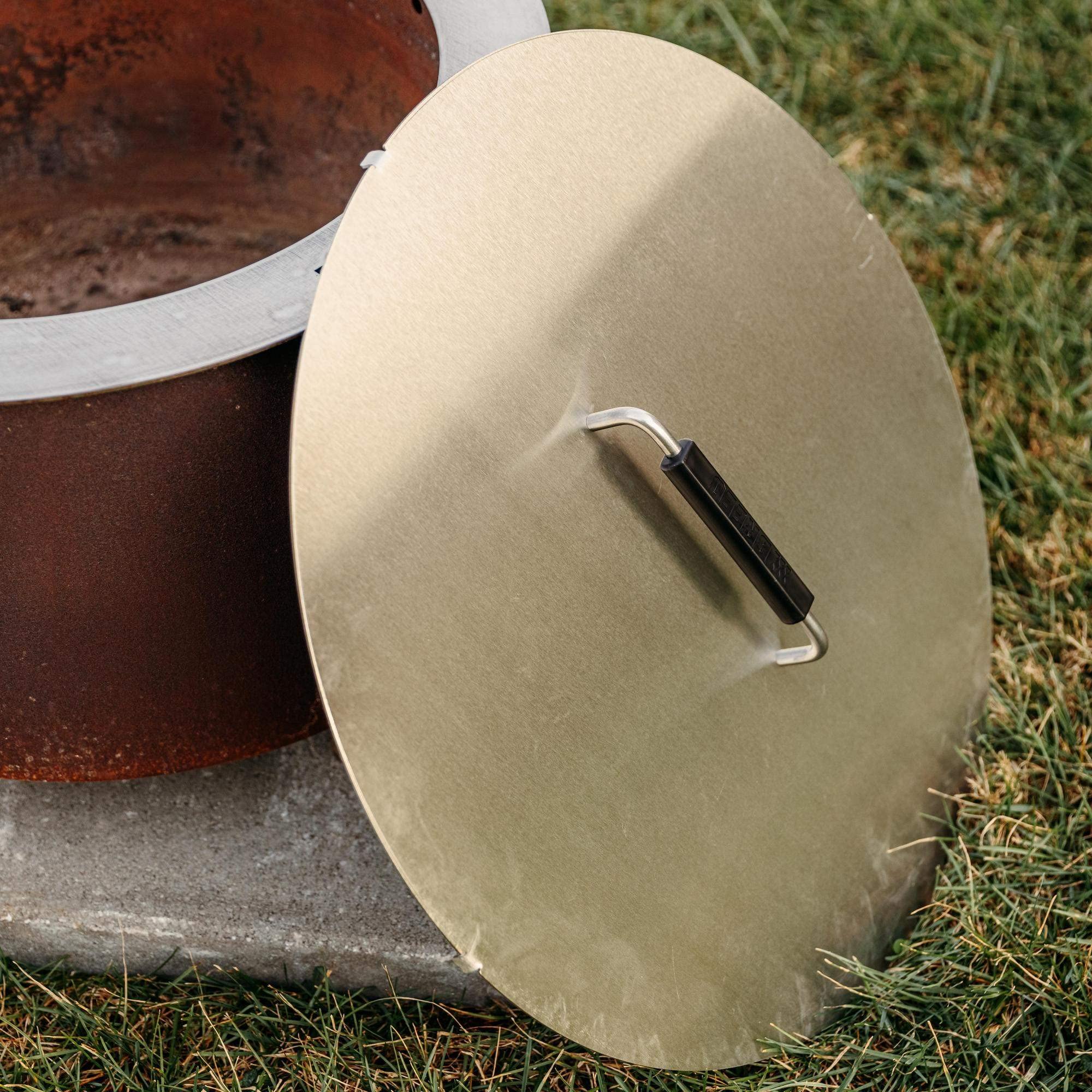Weatherproof Breeo lid helps keep your fire pit dry between uses.
