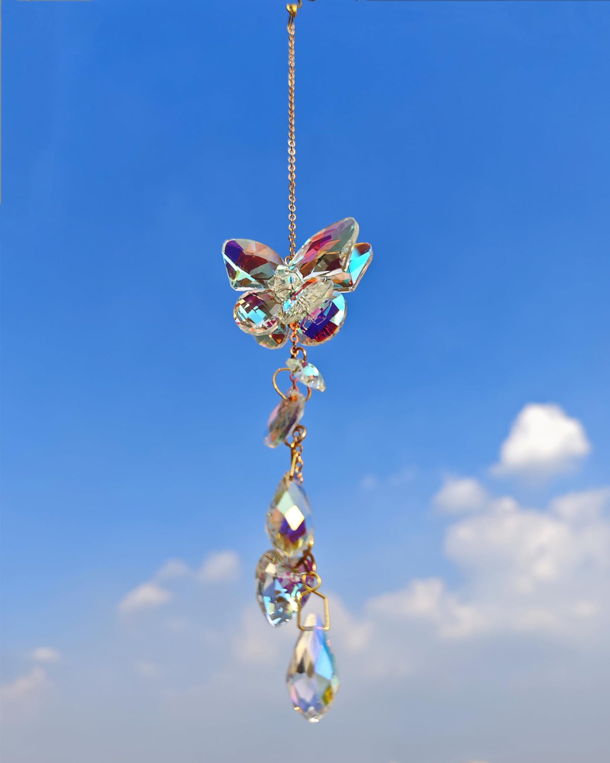 Brezalysia crystal butterfly suncatcher creates rainbow reflections indoors