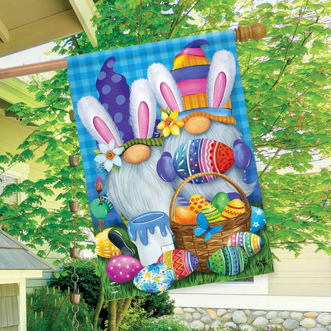 Flag hanging in garden shows Briarwood Lane double-sided print visibility